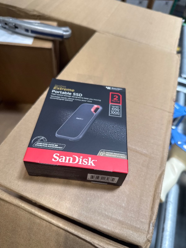 Photo 1 of SanDisk 2TB Extreme Portable SSD - Up to 1050MB/s, USB-C, USB 3.2 Gen 2, IP65 Water and Dust Resistance, Updated Firmware - External Solid State Drive - SDSSDE61-2T00-G25