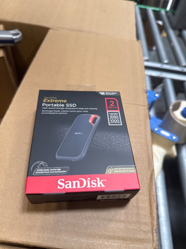 Photo 1 of SanDisk 2TB Extreme Portable SSD - Up to 1050MB/s, USB-C, USB 3.2 Gen 2, IP65 Water and Dust Resistance, Updated Firmware - External Solid State Drive - SDSSDE61-2T00-G25