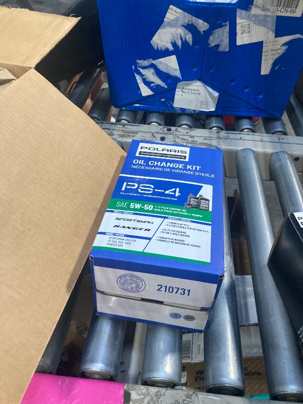 Photo 1 of Polaris PS4 Oil Change Kit for Specific RANGER, Sportsman, Scrambler, ACE 500 Models With 4 Stroke Engine, Includes 2 Quarts of PS-4 5W-50 Full Synthetic Oil, 1 Oil Filter, 1 Washer, UTV ATV - 2877473