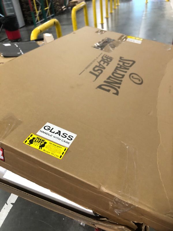 Photo 1 of Spalding The Beast® 60" Tempered Glass Portable Basketball Hoop