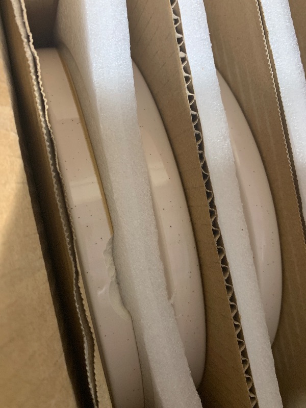 Photo 1 of ***(1 PLATE IS CHIPPED/ MINOR DAMAGE)***Famiware Nebula Plates and Bowls Sets for 4, 12 Pieces Stoneware Dinnerware Set, Microwave and Dishwasher Safe Dishes Set, Light Pink with Brown Rim