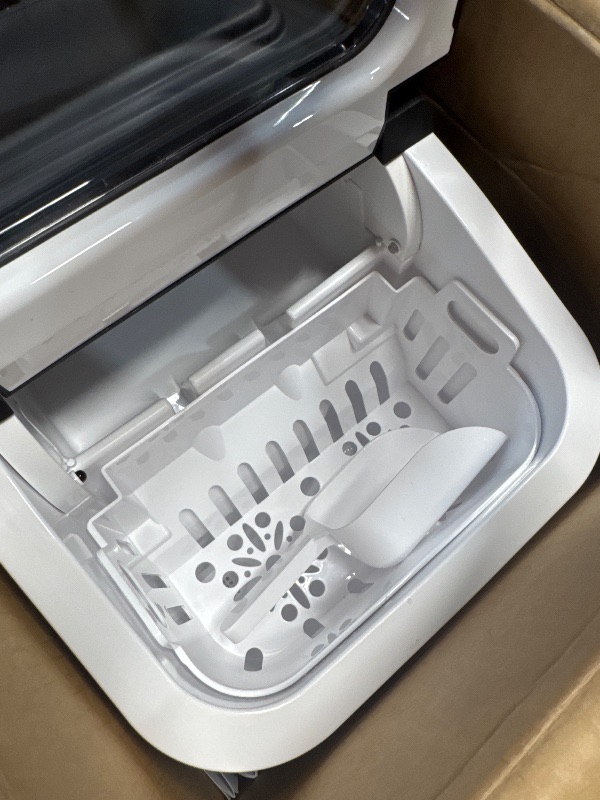 Photo 1 of (PARTS) (DAMAGED) Crzoe Ice Makers Countertop, Ice Machine with Handle, 26Lbs in 24Hrs, 9 Cubes Ready in 6 Mins, Self-Cleaning Portable Ice Maker, 2 Sizes of Bullet Ice Cubes for Home and Office(Black)