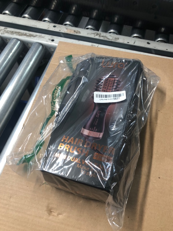 Photo 1 of Automatic Dual Voltage Hair Dryer Brush with European Plug,Mini Travel Blow Dryer Brush for Women,Portable Light Weight One Step Hair Dryer and Styler for Kids