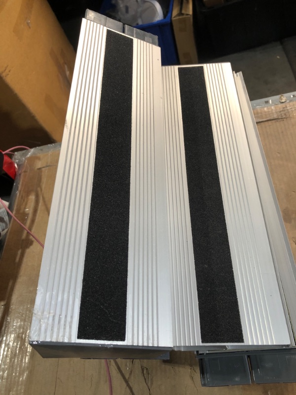 Photo 1 of (used)(unknown if complete) Nuvium 4" Rise Modular Threshold Ramp for Doorways, Stable Wheelchair Ramp for Home Steps, Aluminum Door Ramp and Curb Ramp 
