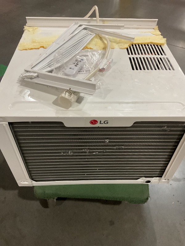 Photo 1 of (Used)(not functional)(sold for parts)(repair) LG 18,000 BTU Window Air Conditioner with Heat, 230/208V, Cools 1,000 Sq.Ft. for Bedroom, Living Room, Basement