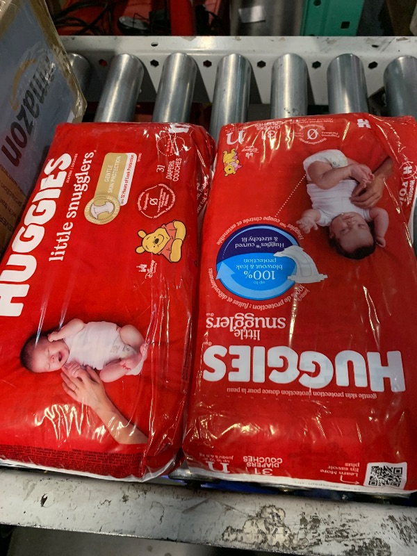 Photo 1 of (PACK OF 2) Huggies Newborn Diapers, Little Snugglers Baby Diapers, Size Newborn (up to 10 lbs), 31 Count