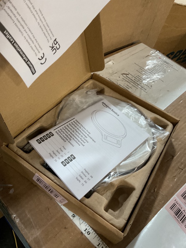 Photo 1 of Amazon Basics Digital Kitchen Scale with LCD Display, Batteries Included, Weighs up to 11 pounds, Black and Stainless Steel