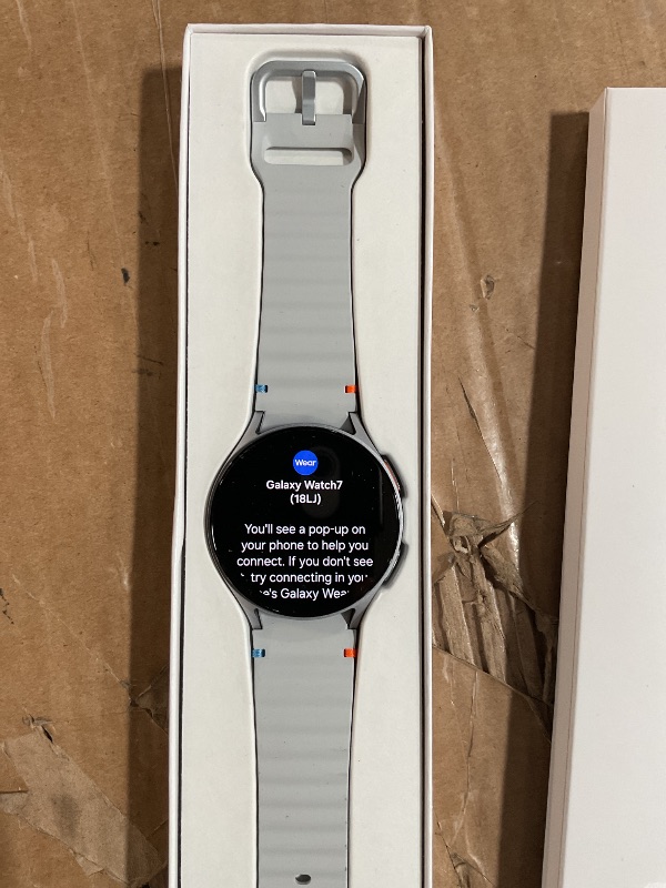 Photo 1 of (POWER TESTED) (UNABLE TO TEST  FURTHER) Samsung Galaxy Watch 7 44mm Bluetooth AI Smartwatch w/Energy Score, Wellness Tips, Heart Rate Tracking, Sleep Monitor, Fitness Tracker, 2024, Silver [US Version, 1Yr Manufacturer Warranty]