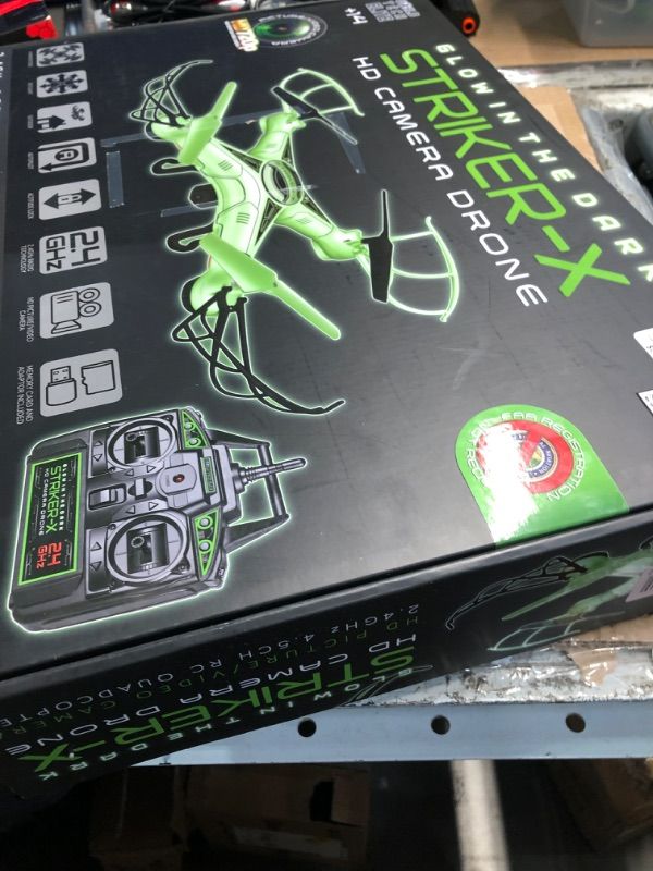 Photo 1 of ***FOR PARTS ONLY***
World Tech Toys Striker-X Glow-In-The-Dark 2.4Ghz 4.5Ch RC HD Camera Drone