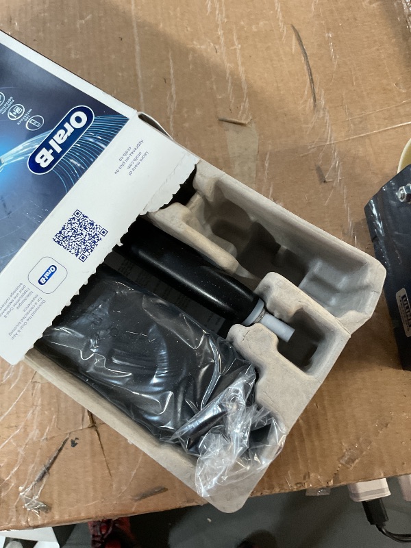 Photo 1 of ***(USED/ MISSING PARTS)***Oral-B iO Series 5 Rechargeable Electric Toothbrush with Visible Pressure Sensor to Protect Gums, 2 Minute Timer, 5 Cleaning Settings, 1 Replacement Toothbrush Heads, and Travel Case, Black