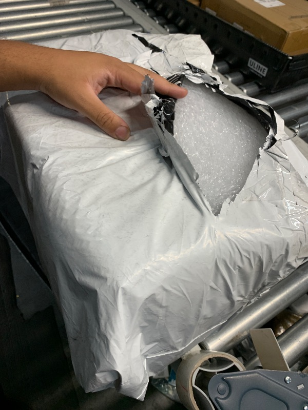 Photo 1 of Amazon Basics Bubble Cushioning Wrap Packing Material for Fragile Items, Perforated, 12-Inch x 175 Foot Long Roll, Small 3/16", Clear