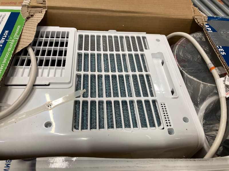 Photo 1 of GE Portable 3-in-1 Air Conditioner with Dehumidifier and Fan, 9,000 BTU, Cooling for 250 sq ft rooms, Includes Remote, Vent Hose and Easy Window Install Kit, WiFi & SMART Connected, White