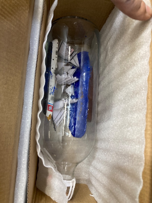 Photo 1 of **SHIP UNGLUED FROM BOTTLE**Hampton Nautical United States Coast Guard USCG Eagle Model Ship in A Glass Bottle, 9" , White,96 months to 600 months