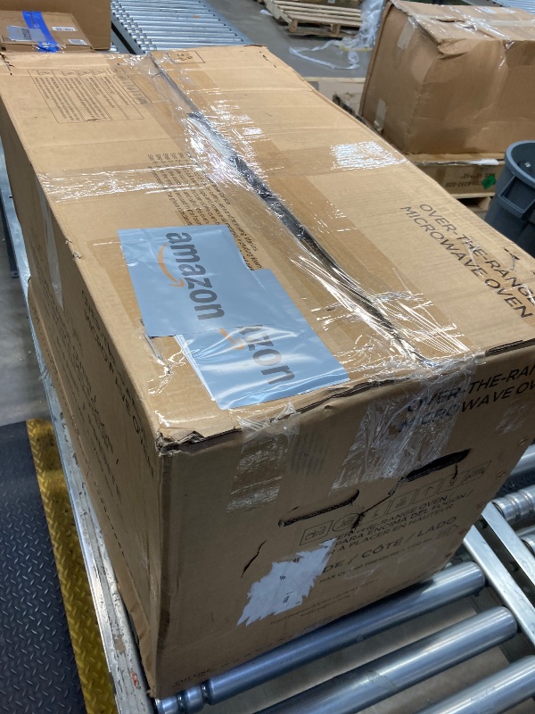 Photo 1 of *****ITEM IS BADLY USED AND DIRTY ****PARTS ONLY***BLACK+DECKER Over the Range Microwave Oven with Vent and One-Touch Auto Cooking, 1.7 cu. ft. OTR Over Stove Microwave, Stainless Steel, 1000 Watts, EM044K6CE-SS