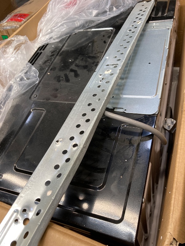 Photo 1 of *****ITEM IS BADLY USED AND DIRTY ****PARTS ONLY***BLACK+DECKER Over the Range Microwave Oven with Vent and One-Touch Auto Cooking, 1.7 cu. ft. OTR Over Stove Microwave, Stainless Steel, 1000 Watts, EM044K6CE-SS
