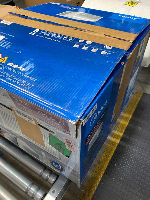 Photo 1 of Midea 12,000 BTU Smart Inverter Air Conditioner Window Unit with Heat and Dehumidifier – Cools up to 550 Sq. Ft., Energy Star Rated, Quiet Operation, Electronic Controls, Remote Control, White