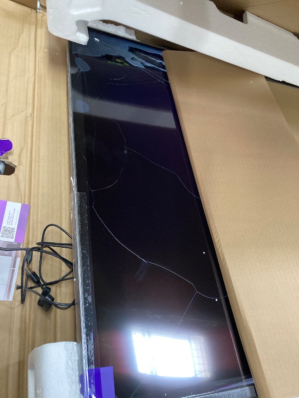 Photo 1 of **CRACKED SCREEN, PARTS ONLY** Roku Smart TV – 65-Inch Select Series 4K HDR RokuTV with Roku Enhanced Voice Remote, Brilliant 4K Picture, Automatic Brightness, & Seamless Streaming – Live Local News, Sports, Family Entertainment