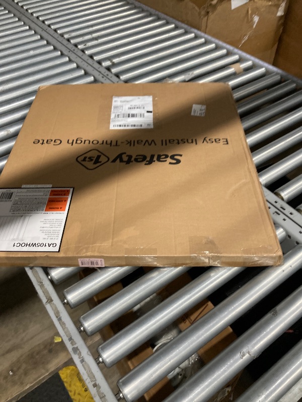 Photo 1 of ***DAMAGED HINGE***Safety 1st Easy Install Walk Thru Baby Gate for Doorways, Gate With Door, Dog Gates, Fits 29"-38", Easy Install 28" Tall, White