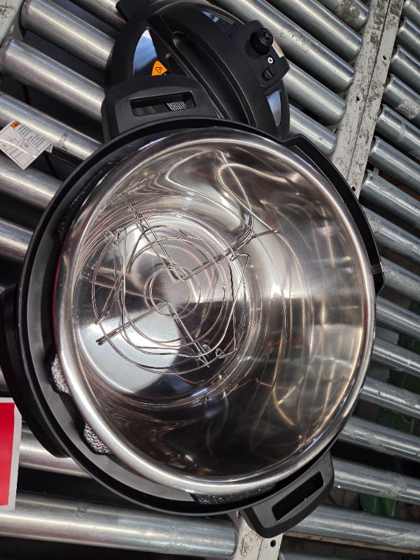 Photo 1 of ***DAMAGED - HUGE DENT - POWERS ON - UNABLE TO TEST FURTHER - SEE PICTURES***
Instant Pot Duo 7-in-1 Electric Pressure Cooker, Slow Cooker, Rice Cooker, Steamer, Sauté, Yogurt Maker, Warmer & Sterilizer, Includes App With Over 800 Recipes, Stainless Steel