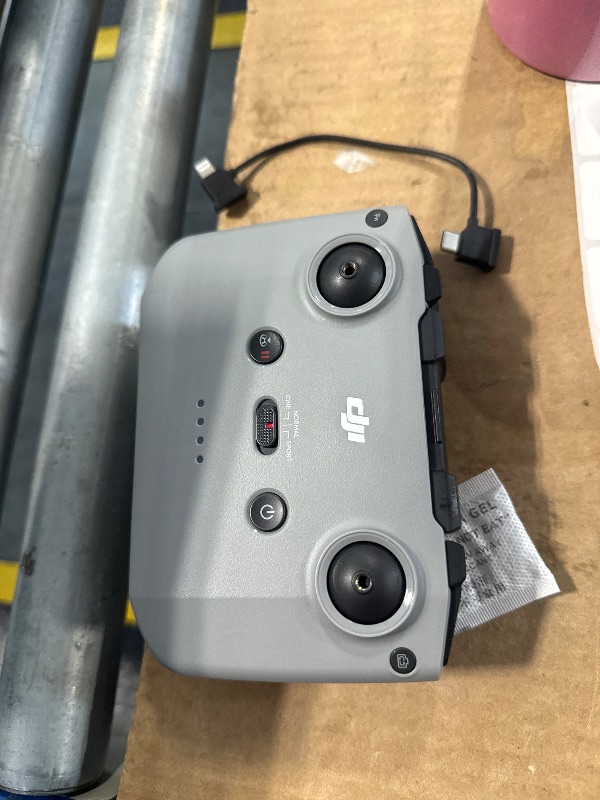 Photo 1 of Original RC-N3 Remote Controller for DJI Neo Mini 4 Pro Air 3 Air 3S Flip Up to 3.5 Hours of Battery Life with Mobile Device Holder