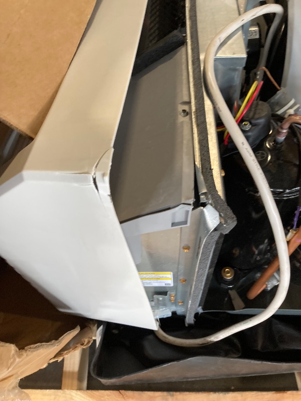 Photo 1 of **will need truck or trailer for pick up-damage to coils and missing thermostat**

AMANA PTAC 16,400 BTU Air Conditioner PTC173K35AXXX with 3.5 KW Heater White