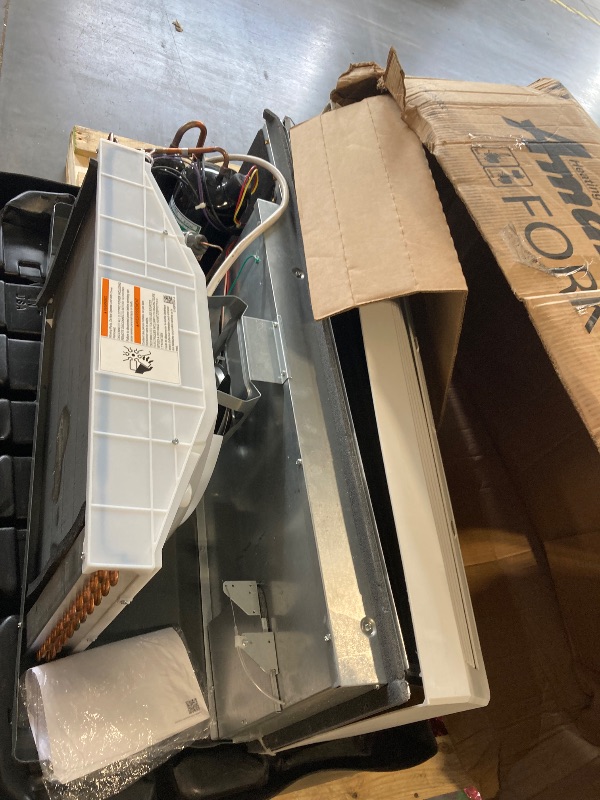 Photo 1 of **will need truck or trailer for pick up-damage to coils and missing thermostat**

AMANA PTAC 16,400 BTU Air Conditioner PTC173K35AXXX with 3.5 KW Heater White