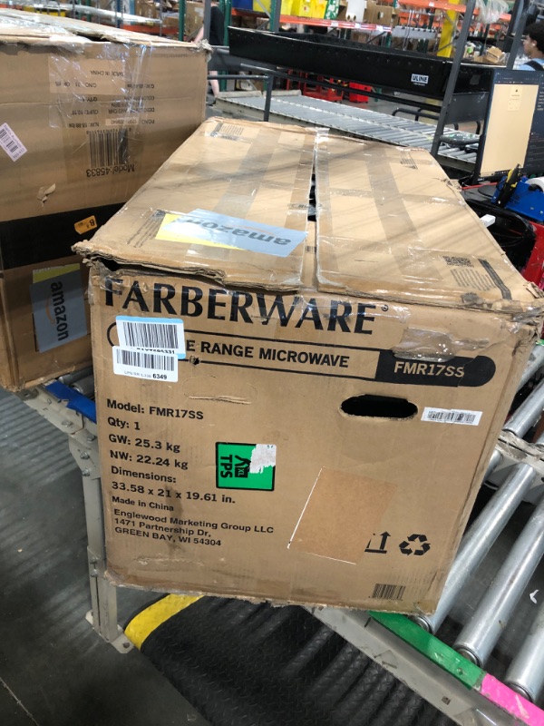 Photo 1 of ** USE FOR PARTS**
\Farberware Over-the-Range Microwave Oven, 1.7 Cu. Ft. - 1000W - Auto Reheat, Multi-Stage Cooking, Melt/Soften Feature, Child Safety Lock, LED Display - Space Efficient & Powerful - Stainless Steel