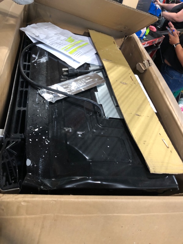 Photo 1 of ** USE FOR PARTS**
\Farberware Over-the-Range Microwave Oven, 1.7 Cu. Ft. - 1000W - Auto Reheat, Multi-Stage Cooking, Melt/Soften Feature, Child Safety Lock, LED Display - Space Efficient & Powerful - Stainless Steel
