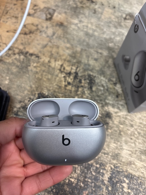 Photo 1 of ***RIGHT HEADPHONE NOT FUNCTIONAL***

Beats Studio Buds + | True Wireless Noise Cancelling Earbuds, Enhanced Apple & Android Compatibility, Built-in Microphone, Sweat Resistant Bluetooth Headphones, Spatial Audio - Cosmic Silver