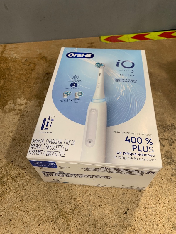 Photo 1 of Oral-B iO Deep Clean Rechargeable Electric Powered Toothbrush, White with iO Series 3 Limited, 2 Brush Heads and Travel Case - Pressure Sensor to Protect Gums - 3 Cleaning Settings - 2 Minute Timer