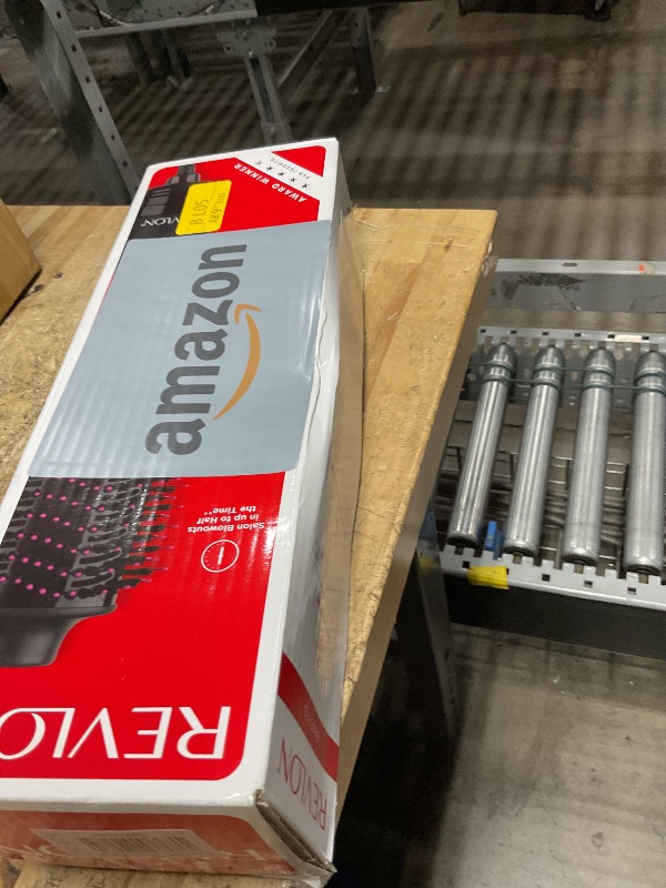 Photo 1 of REVLON One-Step Volumizer Hair Dryer and Styler with Improved Motor – Easy Salon-Style Blowouts – Less Frizz, More Shine, and Reduced Heat Damage, for all Hair Types and Lengths (Black)