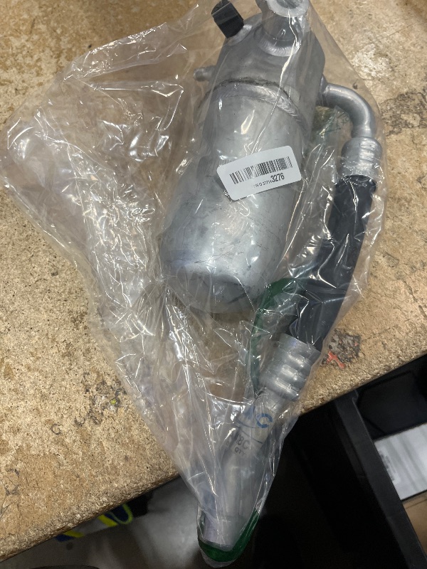 Photo 1 of (Used)(damaged)(sold for parts) UAC HA 10478C A/C Accumulator with Hose Assembly