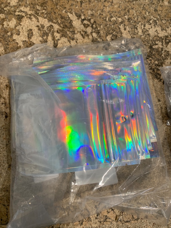 Photo 1 of 100Pcs Holographic Resealable Bags, 4x6 inch Packaging Foil Pouch ?Motomy Mylar Food Storage Bag Great for Small Business and Party Favor……