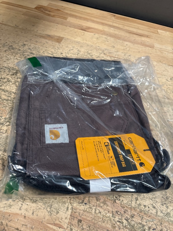 Photo 1 of *BROKEN BUTTONS* Carhartt Women's, Durable, Adjustable Crossbody Bag with Flap Over Snap Closure, Wine
