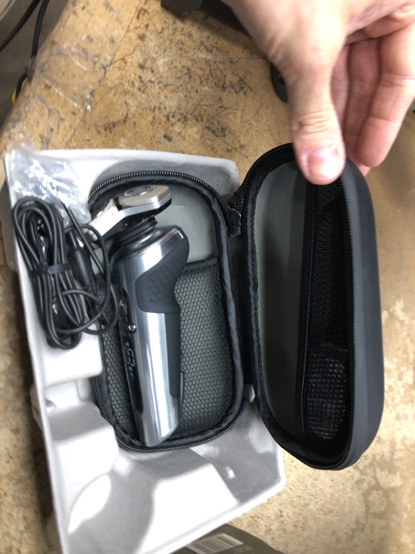 Photo 1 of *****USED******

Philips Norelco S9000 Prestige Rechargeable Wet & Dry Electric Rotary Shaver with Precision Trimmer, Premium Case & Cleaning System, SP9841/84