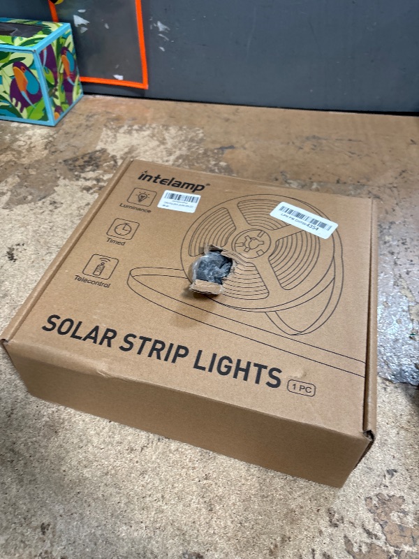 Photo 1 of Lightonight Solar Strip Lights Outdoor, LED Strip Lights Solar Powered 6000mAh 32.8FT 800 LED, Dust to Dawn Solar Strip with Remote Auto On/Off for Deck House Garden Balcony Pool(Warm White)