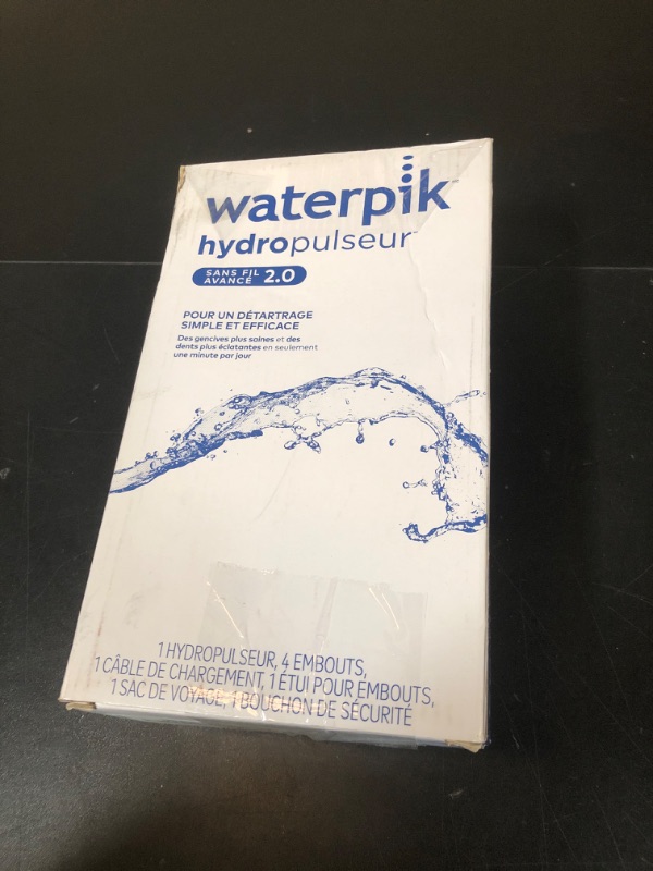 Photo 2 of Waterpik Cordless Advanced 2.0 Water Flosser For Teeth, Gums, Braces, Dental Care With Travel Bag and 4 Tips, ADA Accepted, Rechargeable, Portable, and Waterproof, Blue WP-583, Packaging May Vary