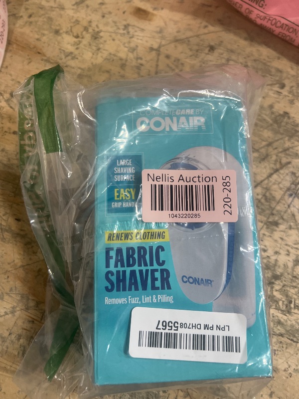 Photo 1 of Conair Fabric Shaver and Lint Remover, Battery Operated Portable Fabric Shaver, White