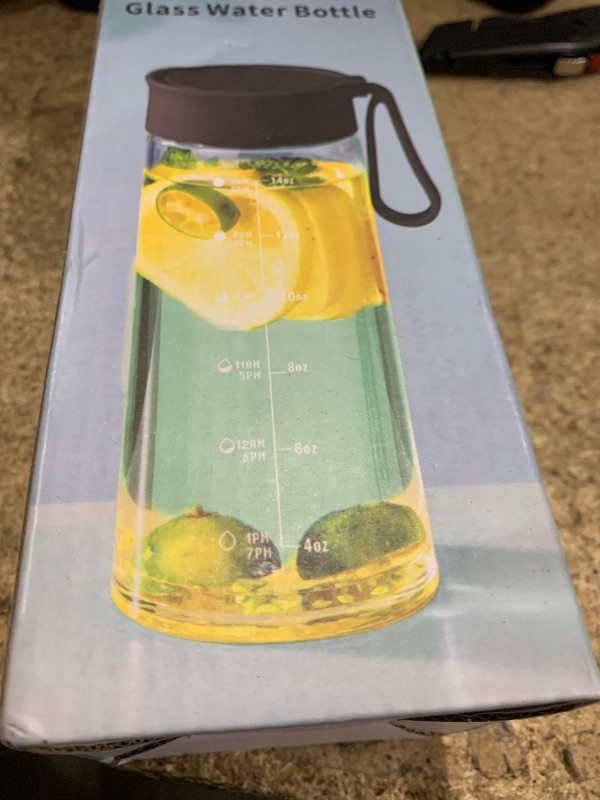 Photo 1 of Doseno Glass Bottles with Lids, Glass Water Bottle with Time Marker, 17oz Glass Bottles with Carrying Strap, Glass bottle for Juicing for Office, Gym (black)