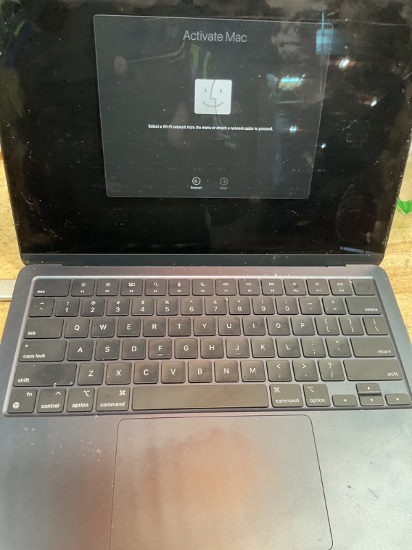 Photo 1 of Apple 2022 MacBook Air M2 Chip (13-inch, 8GB RAM, 256GB SSD Storage) (QWERTY English) Midnight (Renewed Premium)