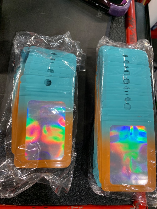 Photo 1 of ***(NOT A COMPLETE SET/ MISSING PARTS)***
400 Pack 1 Size Bags with Clear Window,Scratch Resistant Hand Holographic Packaging Pouch,Resealable Bag for Small Bussiness Cookies Jewelry Candy Sample (Green Orange, 2.4×3.9,3x4.7,4×7,5.5×7.9 inch)