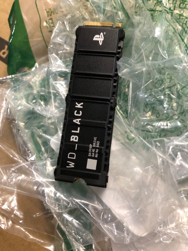 Photo 1 of ***(NO RETURNS OR REFUNDS/ FOR PARTS ONLY/ NON FUNCTIONAL)***
WD_BLACK 2TB SN850P NVMe M.2 SSD Officially Licensed Storage Expansion for PS5 Consoles, up to 7,300MB/s, with heatsink - WDBBYV0020BNC-WRSN