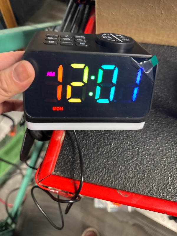 Photo 1 of ****Powers on ***
Digital Alarm Clock with FM Radio for Bedroom, 8 Colors Night Light with 2 Charging Port, Sleep Sound Machines with Timer, Dual Alarm, Loud Alarm and Easy to Use for Seniors and Kids as Gift (Black)