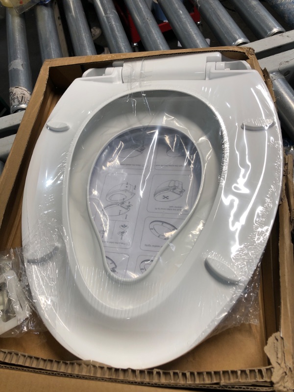 Photo 1 of **FACTORY SEALED**Elongated Toilet Seat with Toddler Seat Built In Soft Close, Slow Close Family Toilet Seat with Potty Training Seat White
