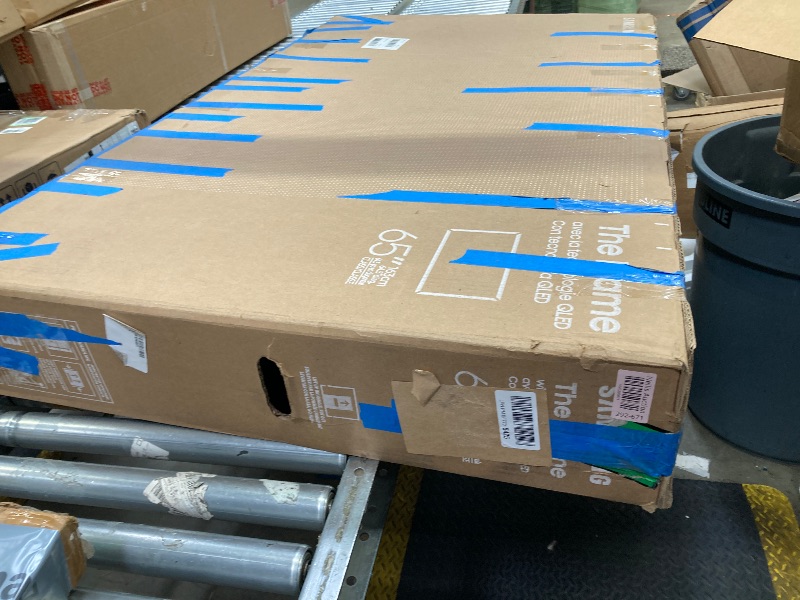 Photo 1 of ***(SELLING AS PARTS ONLY -SCUFFS/SCRATCHES, BROKEN SCREEN)*** 
Samsung 65-Inch Class QLED 4K LS03D The Frame Series Quantum HDR Smart TV w/Dolby Atmos, Art Mode, Anti-Reflection, Customizable Frame, Slim Fit Wall Mount with Alexa Built-in (QN65LS03D, 202