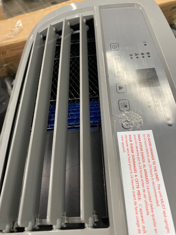 Photo 1 of ***(ITEM DOESN'T TURN ON -SELLING AS PARTS ONLY)***
BLACK+DECKER 10,000 BTU Portable Air Conditioner for Rooms up to 450 Sq. with Remote Control, White  ***(OPEN BOX, BOX RIPPED/TORN, SOME SCUFFS/SCRATCHES)***