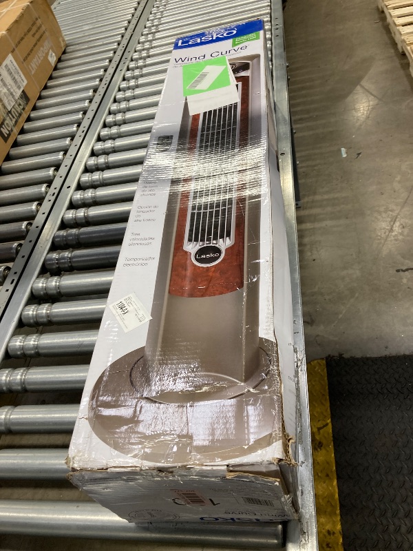 Photo 1 of ***PARTS ONLY**Lasko Wind Curve Oscillating Tower Fan, Fresh Air Ionizer, Timer, Remote Control, Portable Electric Fan for Indoor, Bedroom and Home Office Use, 42", Silverwood 2554