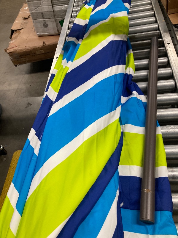 Photo 1 of SIMILAR TO JEAREY 8x10 ft Rectangular Patio Umbrellas Outdoor Table Market Umbrella w/Crank, 8 Sturdy Ribs, UV Protection Waterproof Sunproof(Blue Green Striped)  ***(SOME SMALL DIRT SPOTS, SMALL RUST AREA ON POLOE, BOX RIPPED/TORN...SEE ALL PHOTOS)***