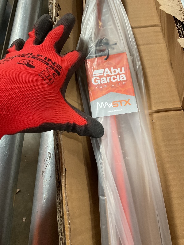 Photo 1 of Abu Garcia 7’ Max STX Fishing Rod and Reel Baitcast Combo, 5 +1 Ball Bearings with Lightweight Graphite Frame & Sideplates, MagTrax Brake System