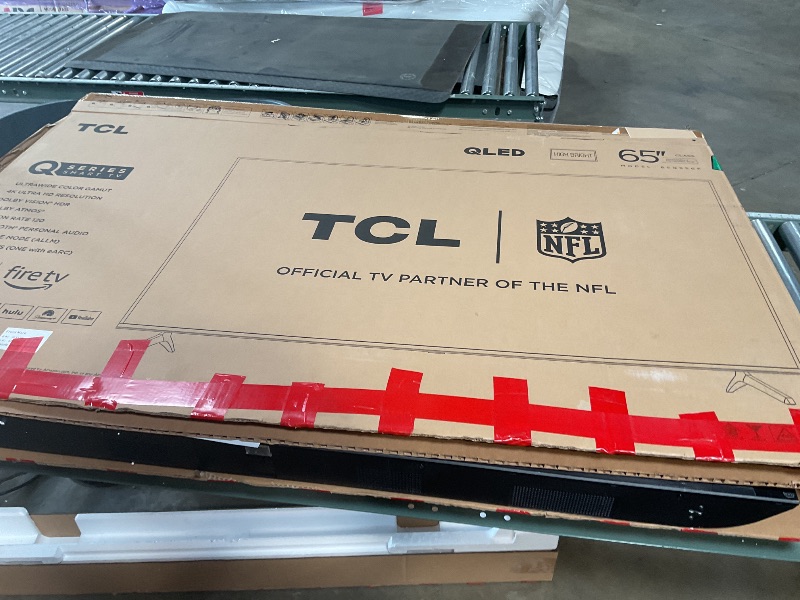 Photo 1 of ** screen cracked see pictures**TCL 65 inch Q series smart TV ultra wide color gambit 4K ultra HD resolution Dolby Vision HDR Dolby Atmos motion rate 120 Bluetooth personal audio auto game mode three HDMI inputs fire TV